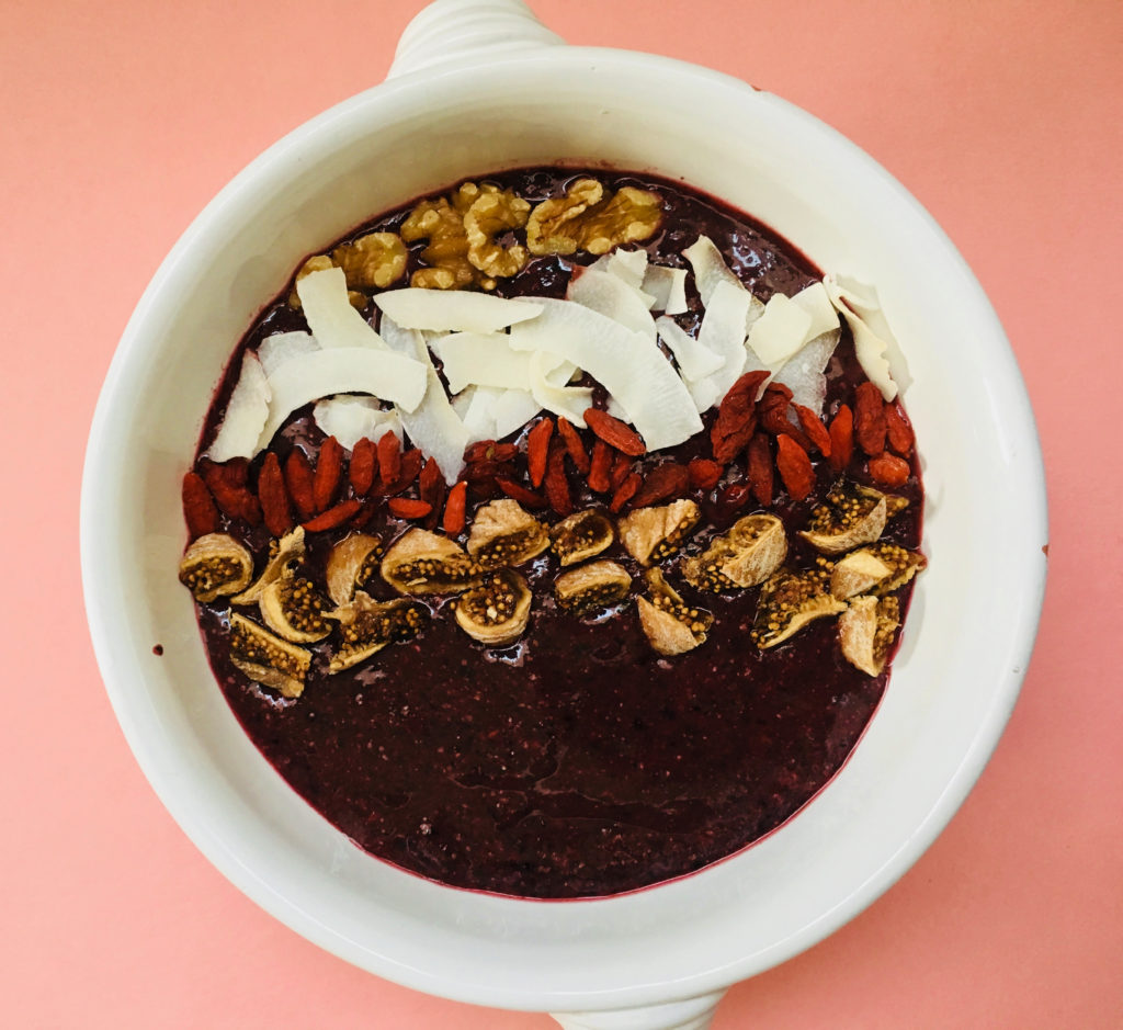 Acai berry smoothie bowl for Valentine day breakfast in bed