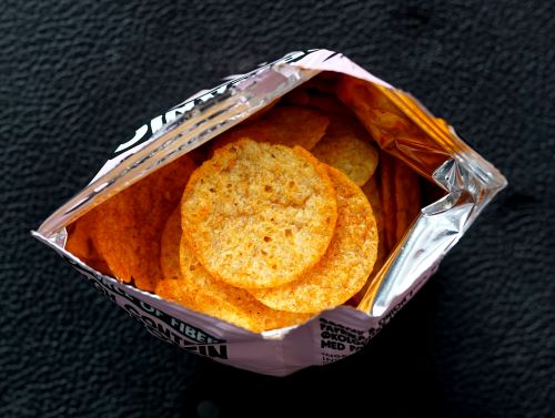 open bag of chips, managing emotional eating for high-achievers
