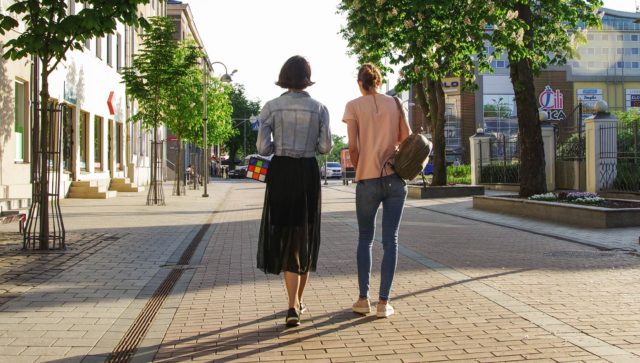 photo of two women walking down the street work-life balance