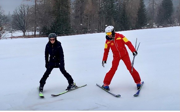 Rita May skiing